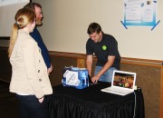 Junior Kyle Freischlag (right) gave the closing remarks at the Oxfam Hunger Banquet, encouraging attendees to think about how much food they waste.