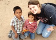 Patsy Snead with local children on a Campus Ministries service trip to Texas over winter break.
